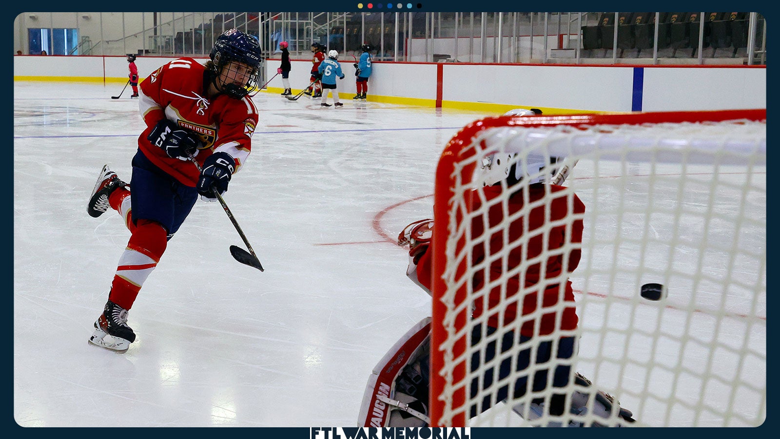 Hockey at Baptist Health IcePlex. Photo of hockey player shooting a puck.